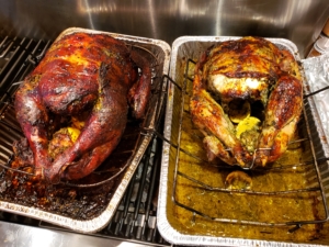 Two turkeys - cooked on the grill (left) and in the oven (right)