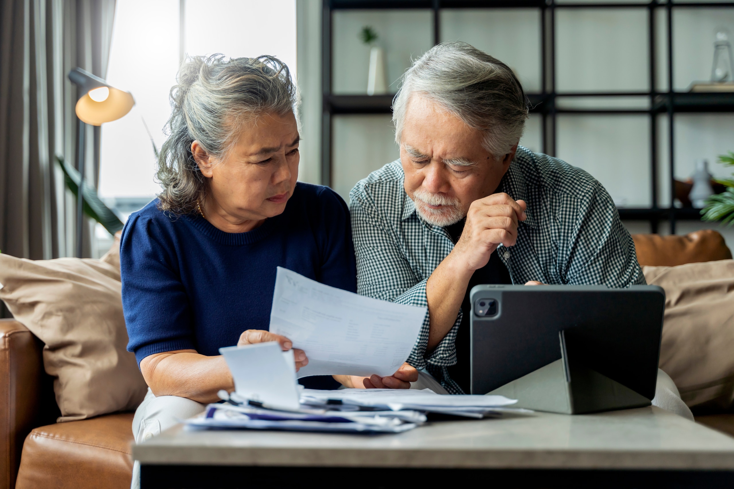 a senior couple considers a reverse mortgage