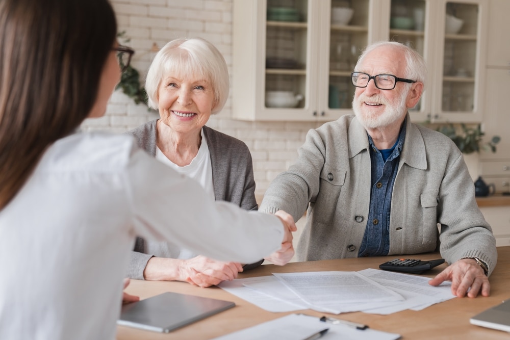 Successor Trustee - elderly home buyers signing paperwork