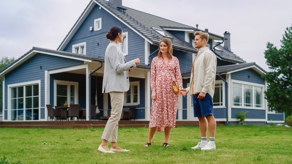 real estate agent showing investment property