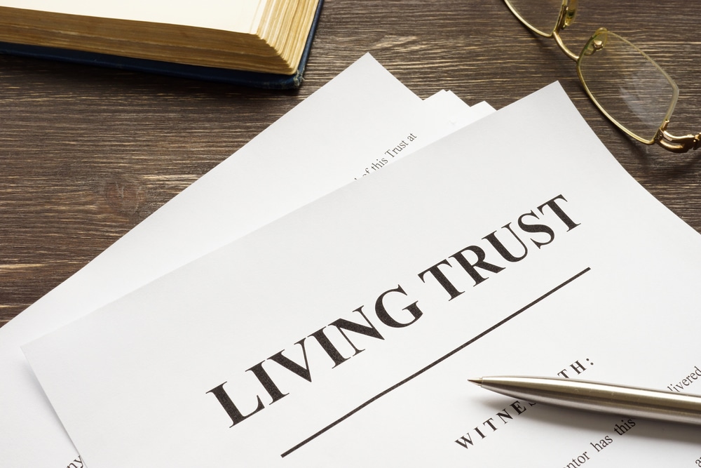 Documents on a desk that say living trust