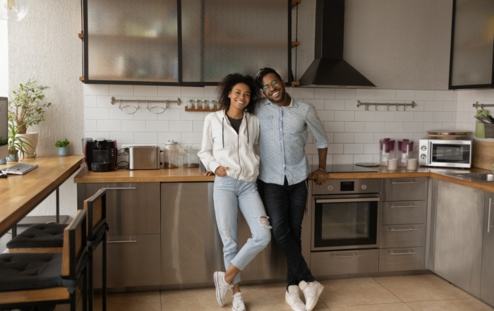 Couple in their kitchen